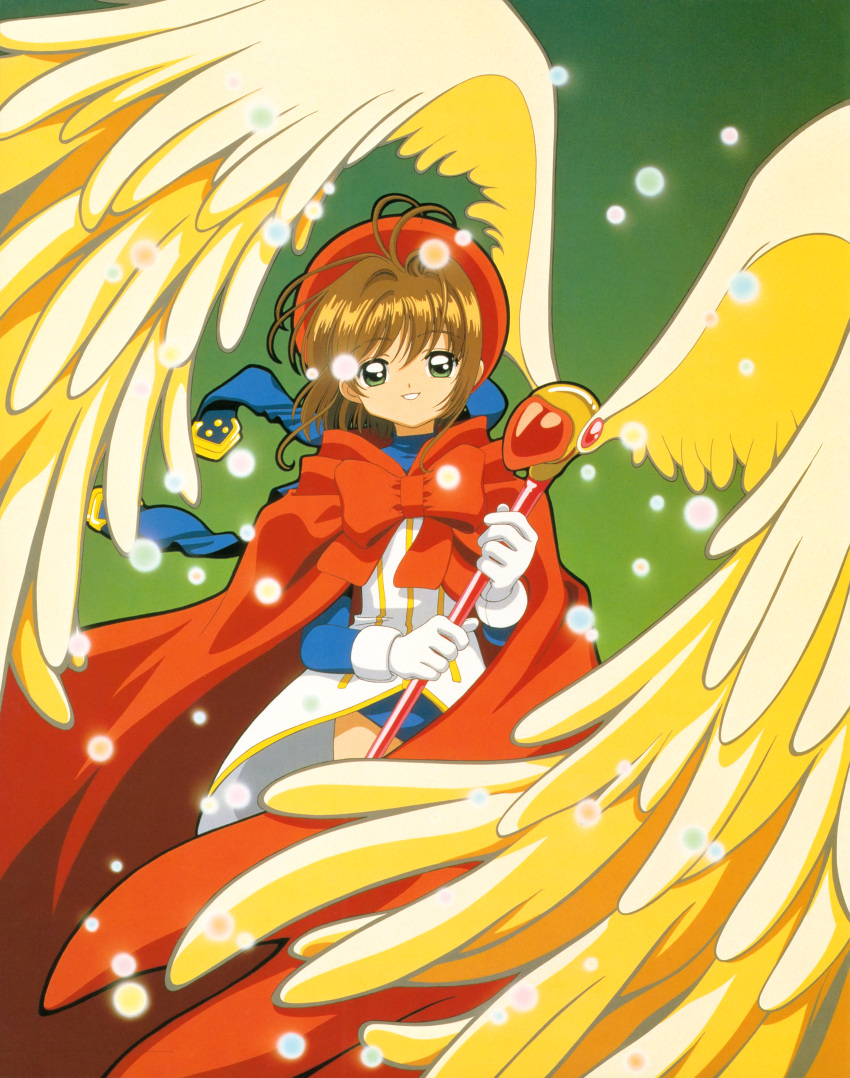 1girl absurdres bow brown_hair cape cardcaptor_sakura child gloves green_background green_eyes happy highres holding holding_wand kinomoto_sakura magical_girl official_art red_bow red_cape red_headwear short_hair simple_background smile solo standing teeth wand white_gloves wings