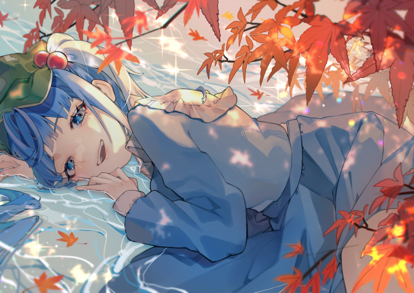 1girl absurdres blue_eyes blue_hair blue_shirt blue_skirt commentary_request flat_cap green_headwear hair_bobbles hair_ornament hat highres kappa_mame kawashiro_nitori leaf long_sleeves looking_at_viewer lying lying_on_water maple_leaf medium_hair open_mouth shirt skirt smile solo sparkle touhou two_side_up water