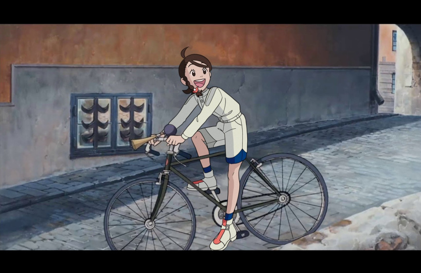 1girl :d ahoge bicycle black_eyes blue_socks braid brown_hair commentary day eyelashes happy highres jacket juliana_(pokemon) long_sleeves looking_to_the_side majo_no_takkyuubin open_mouth outdoors pokemon pokemon_sv riding riding_bicycle road shoes shorts smile socks solo street submashell teeth tongue upper_teeth_only white_footwear white_jacket white_shorts