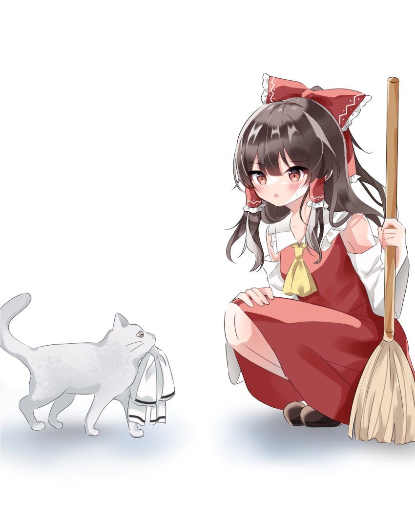 1girl ascot blush bow broom brown_hair cat clothes_in_mouth commentary_request detached_sleeves frilled_bow frilled_hair_tubes frills hair_bow hair_tubes hakurei_reimu hidukihumi highres holding holding_broom long_hair open_mouth red_bow red_skirt shadow simple_background skirt skirt_set solo touhou white_background yellow_ascot