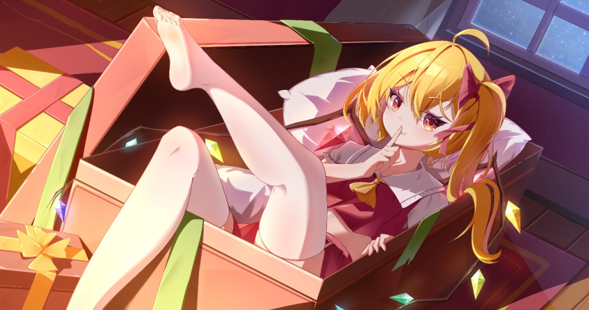 1girl ahoge ascot blonde_hair christmas dress feet finger_to_mouth flandre_scarlet full_body gift indoors kk_snake on_bed pillow red_dress red_eyes red_ribbon ribbon shushing side_ponytail solo thigh-highs touhou yellow_ascot