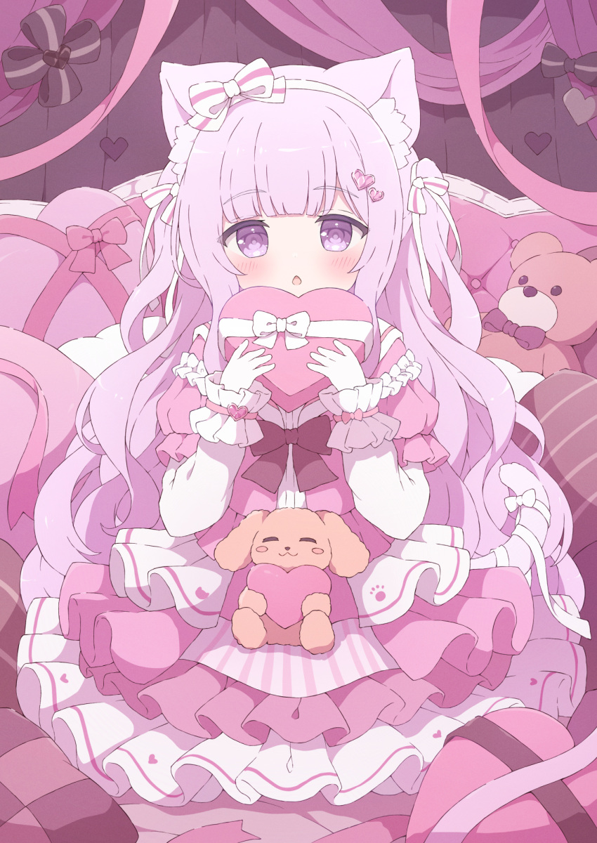 1girl animal_ear_fluff animal_ears blush box box_of_chocolates cat_ears cat_girl cat_tail commentary dress hair_ornament heart heart-shaped_box heart_hair_ornament highres long_hair long_sleeves looking_at_viewer open_mouth original pink_dress pink_eyes pink_hair pink_theme solo straight-on stuffed_animal stuffed_toy symbol-only_commentary tail teddy_bear tyakomes valentine very_long_hair