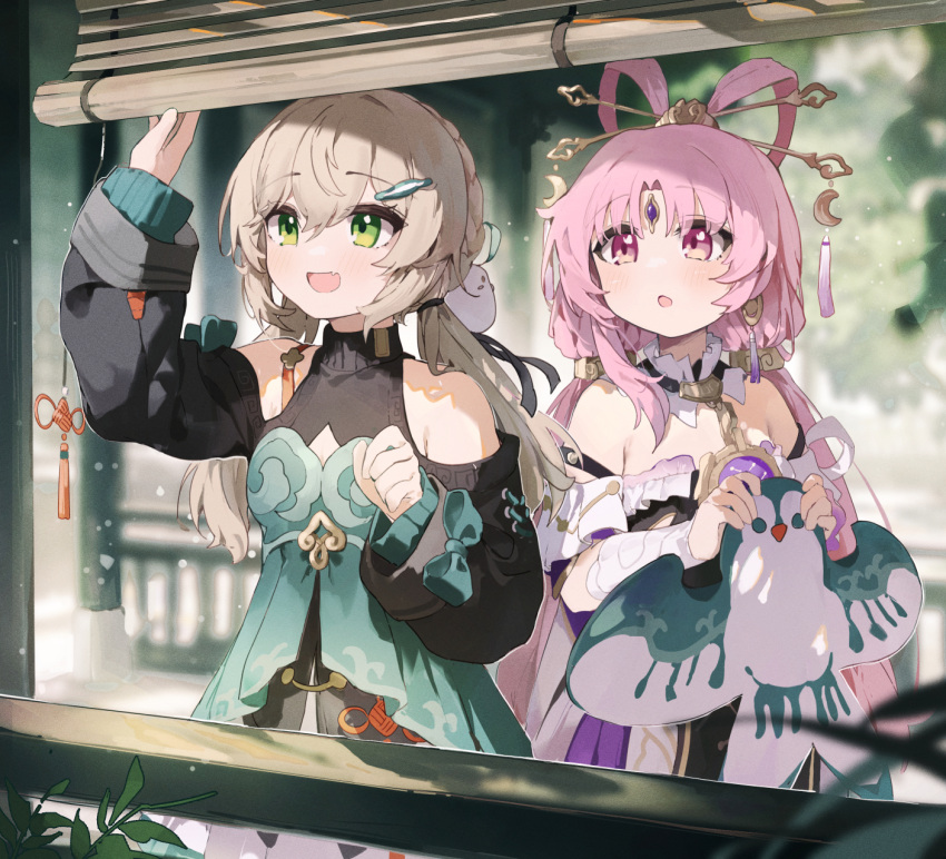 2girls arm_up armpit_crease bamboo_screen bare_shoulders black_ribbon blurry blurry_background blush brown_hair coria detached_collar double-parted_bangs dress fang forehead_jewel fu_xuan_(honkai:_star_rail) green_dress green_eyes hair_between_eyes hair_ornament hair_ribbon hair_rings hair_stick hairclip highres holding_kite honkai:_star_rail honkai_(series) long_hair long_sleeves low_twintails multiple_girls off-shoulder_dress off_shoulder open_mouth parted_bangs pink_hair purple_dress qingque_(honkai:_star_rail) railing ribbon skin_fang twintails violet_eyes