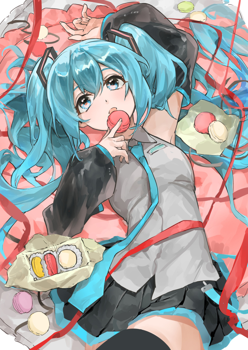 1girl between_fingers black_skirt black_thighhighs blue_eyes blue_hair breast_pocket detached_sleeves eyelashes feet_out_of_frame fingernails food grey_shirt hair_between_eyes hatsune_miku highres himukai_aoi holding holding_food long_sleeves looking_at_viewer lying macaron on_back open_mouth pocket red_ribbon ribbon shirt skirt solo thigh-highs twintails vocaloid zettai_ryouiki
