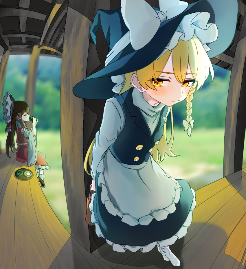 2girls apron arms_behind_back black_hair black_headwear black_skirt black_vest blonde_hair bow closed_mouth commentary day drinking foreshortening frilled_apron frilled_skirt frills frown full_body gift hair_between_eyes hakurei_reimu hat hat_bow highres holding holding_gift jitome kirisame_marisa koroyarou long_hair long_sleeves looking_down multiple_girls nontraditional_miko outdoors shirt shy sitting skirt solo_focus standing touhou valentine vest waist_apron white_apron white_bow white_shirt witch_hat yellow_eyes yuri