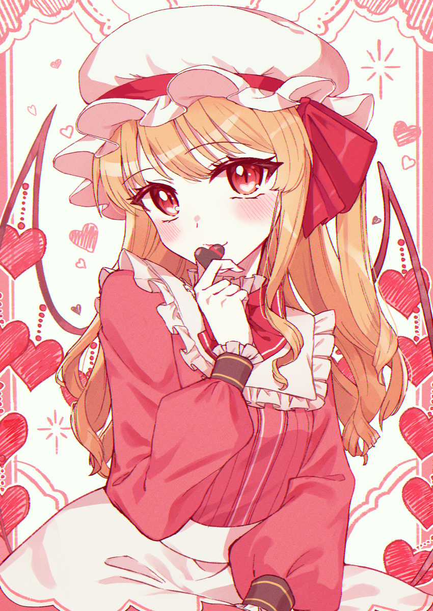1girl absurdres bat_wings blonde_hair blush candy chocolate cowboy_shot dress flandre_scarlet food frills hat heart heart-shaped_chocolate highres long_hair looking_at_viewer mob_cap nano_popo02 red_dress red_eyes red_ribbon ribbon side_ponytail sitting solo touhou wings