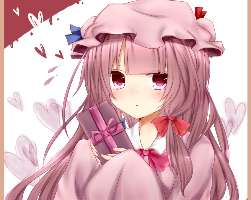 1girl blue_bow blue_ribbon bow bowtie box collared_dress commentary_request dress frilled_headwear gift gift_box hair_bow hat hat_ribbon heart highres holding holding_gift light_blush long_hair long_sleeves looking_at_viewer misa_(kaeruhitode) mob_cap patchouli_knowledge pillarboxed pink_dress pink_eyes pink_hair pink_headwear red_bow red_ribbon ribbon solo touhou upper_body valentine very_long_hair white_background