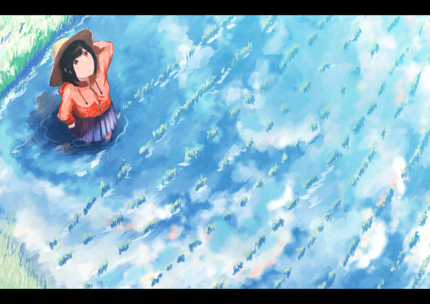 1girl black_hair blue_skirt commentary_request day from_above hat hood hood_down hooded_jacket inami_hatoko jacket letterboxed looking_up orange_jacket original outdoors pleated_skirt red_eyes rice_paddy short_hair sidelocks skirt solo straw_hat sun_hat wading