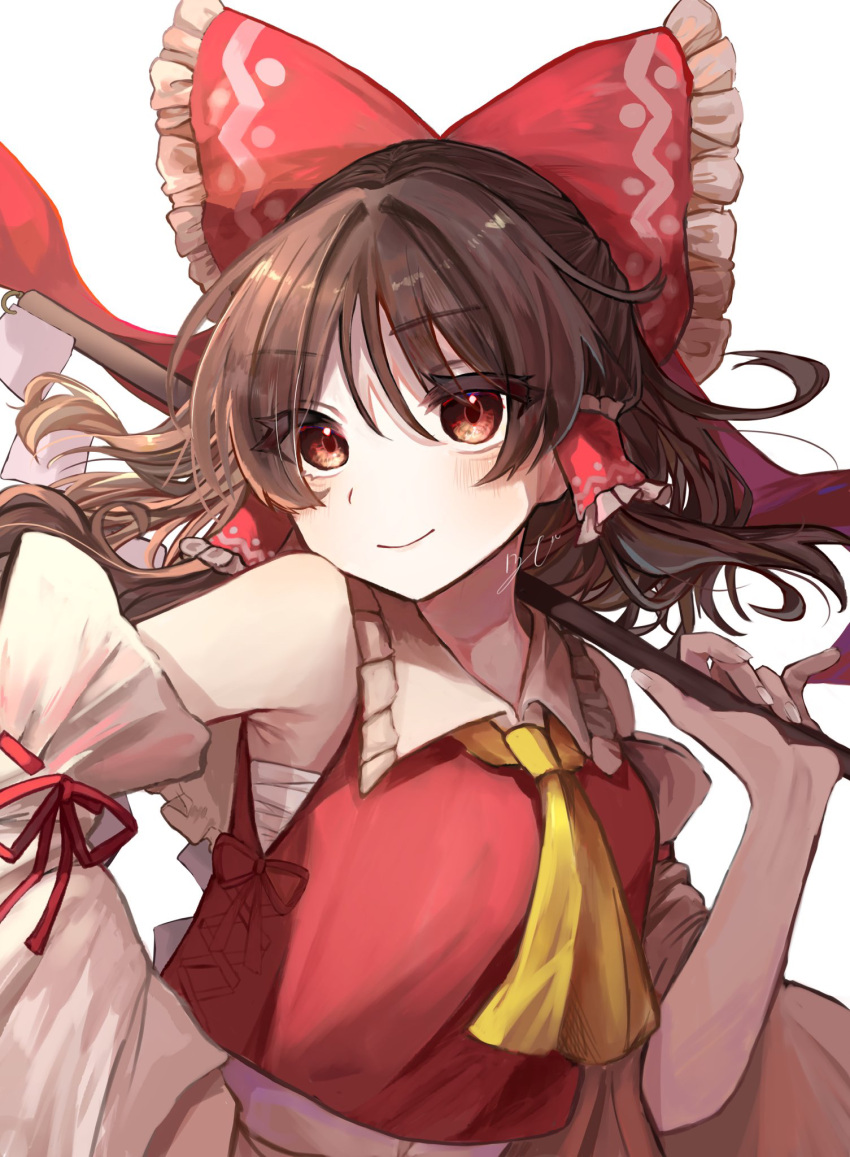 1girl armpit_crease ascot bare_shoulders blush bow brown_eyes brown_hair closed_mouth commentary detached_sleeves eyelashes floating_hair frilled_bow frilled_hair_tubes frilled_shirt_collar frills gohei hair_between_eyes hair_bow hair_tubes hakurei_reimu hand_on_own_hip hand_up highres holding holding_gohei huge_bow izumi_no_yasushi_aya long_hair long_sleeves looking_at_viewer nontraditional_miko red_bow red_shirt shirt sidelighting sidelocks simple_background sleeveless sleeveless_shirt smile solo touhou upper_body white_background wide_sleeves yellow_ascot