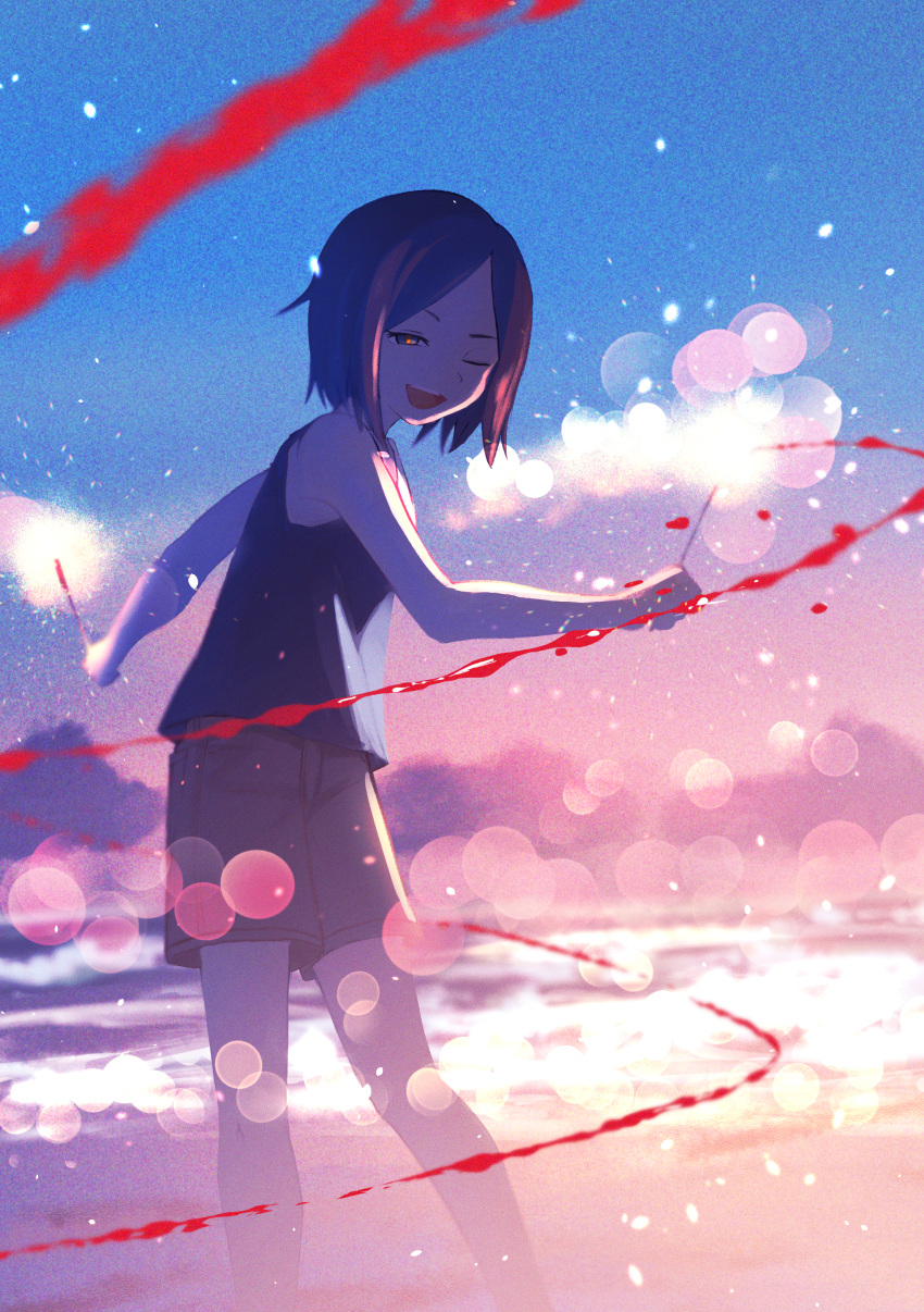 1girl absurdres beach black_eyes black_hair blue_shirt blurry bokeh brown_shorts commentary depth_of_field highres holding_fireworks inami_hatoko ocean one_eye_closed open_mouth original outdoors shirt short_hair shorts sleeveless sleeveless_shirt solo sparkle teeth upper_teeth_only