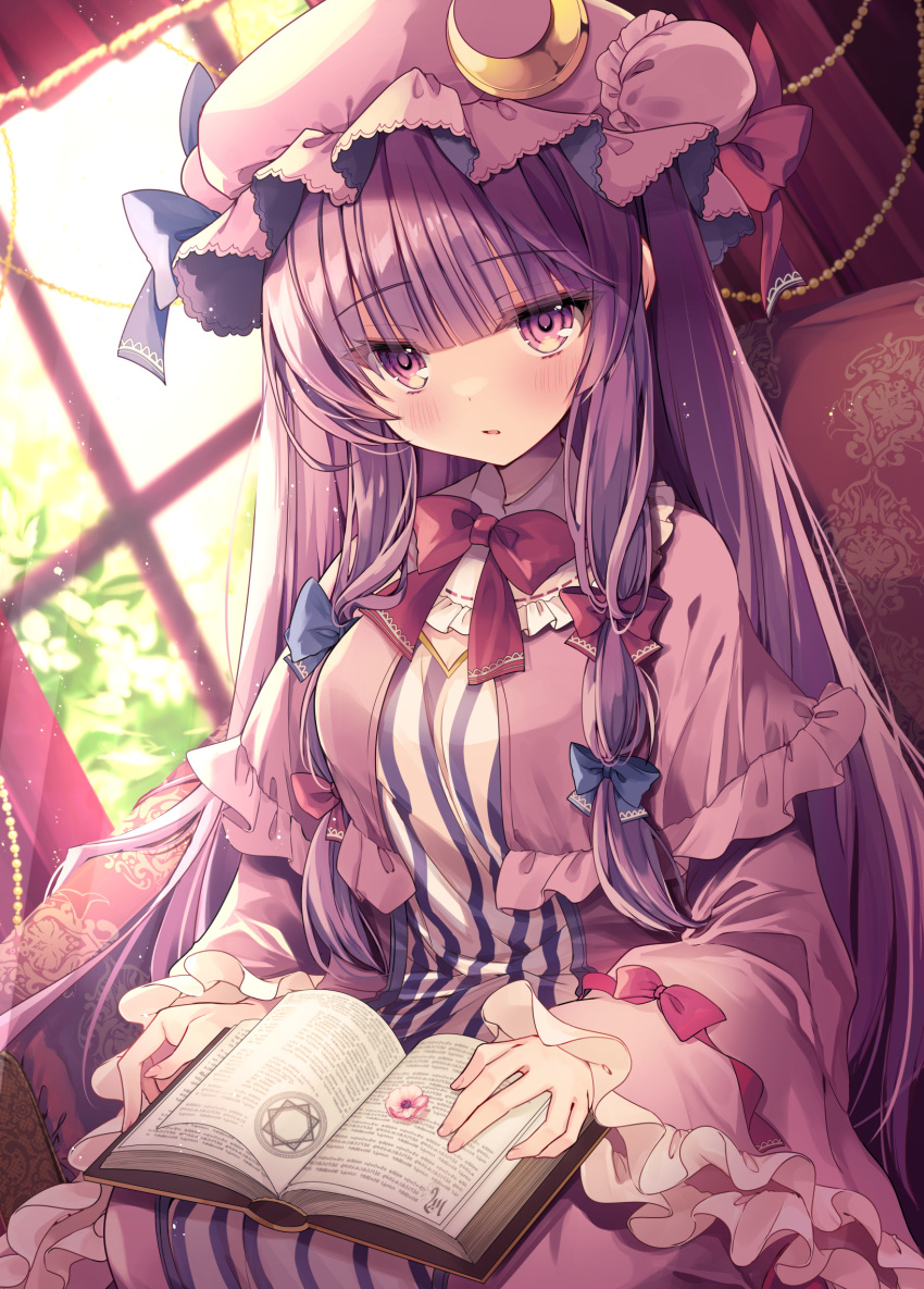 1girl blue_bow blush book bow breasts crescent crescent_hat_ornament dress fingernails frilled_sleeves frills hair_bow hat hat_ornament highres indoors kasane_(cynthia) large_breasts long_hair long_sleeves looking_at_viewer mob_cap open_book open_mouth patchouli_knowledge purple_dress purple_hair purple_headwear red_bow sidelocks sitting solo striped_clothes striped_dress touhou vertical-striped_clothes vertical-striped_dress violet_eyes wide_sleeves window