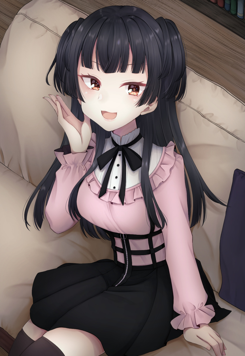 1girl :d arm_at_side bad_perspective black_hair black_skirt black_thighhighs blunt_bangs bookshelf bow bowtie brown_eyes buttons couch dress frilled_shirt_collar frills hand_up highres idolmaster idolmaster_shiny_colors long_hair long_sleeves looking_at_viewer mayuzumi_fuyuko open_mouth pillow pink_dress red_bow red_bowtie sakuma_(yr_0920) sitting skirt smile solo thigh-highs two_side_up wooden_floor zettai_ryouiki