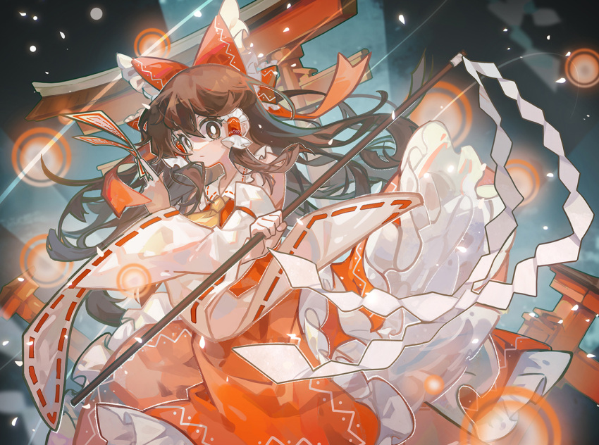 1girl ascot bow brown_eyes brown_hair closed_mouth detached_sleeves hair_bow hakurei_reimu long_hair looking_at_viewer red_bow ribbon solo suelement touhou yellow_ascot