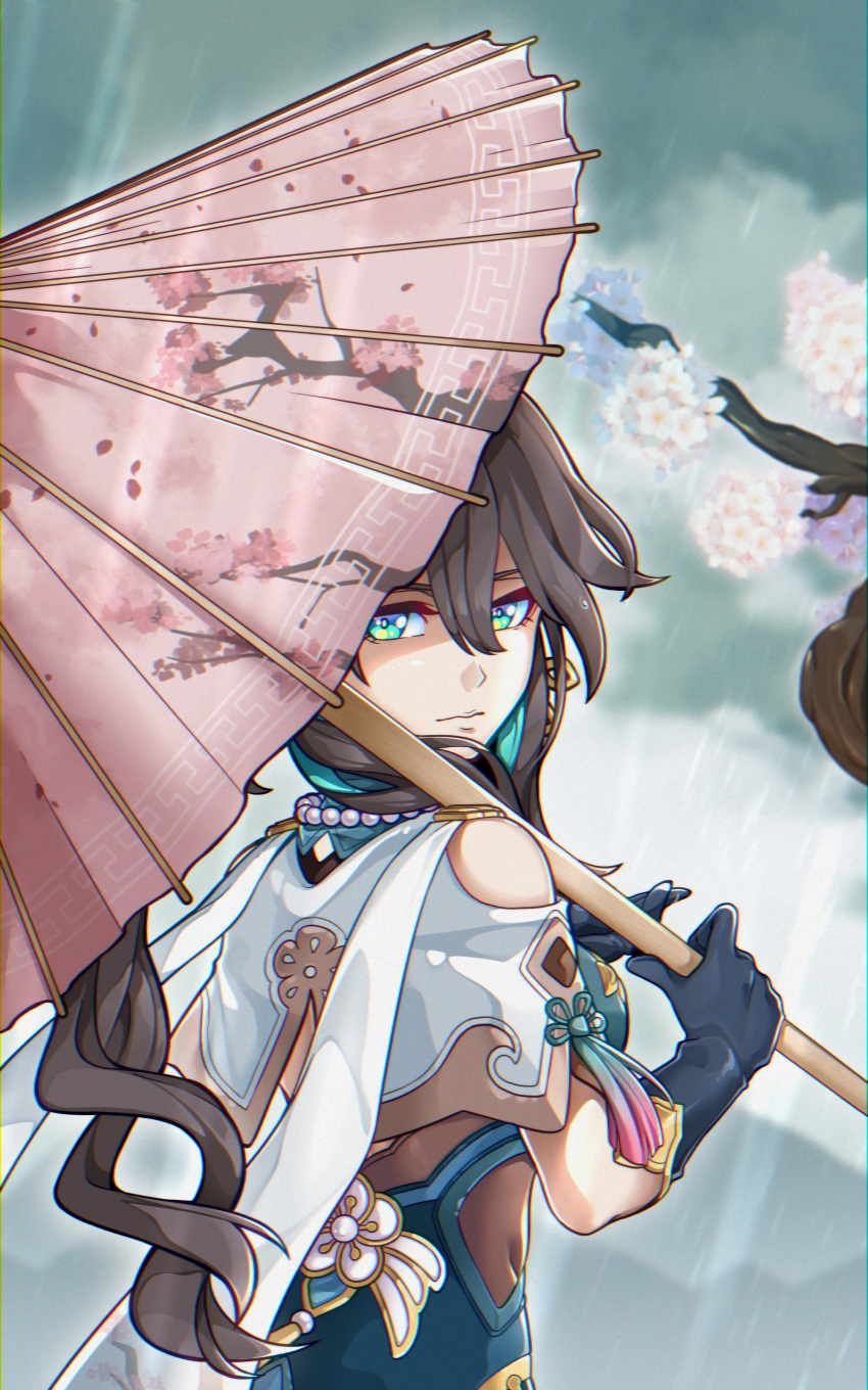 1girl absurdres black_gloves brown_hair cape cherry_blossoms earrings english_commentary flower gloves green_eyes hair_between_eyes highres holding holding_umbrella honkai:_star_rail honkai_(series) jewelry long_hair looking_at_viewer necklace oil-paper_umbrella peter_eastwood ruan_mei_(honkai:_star_rail) solo tree umbrella wavy_hair