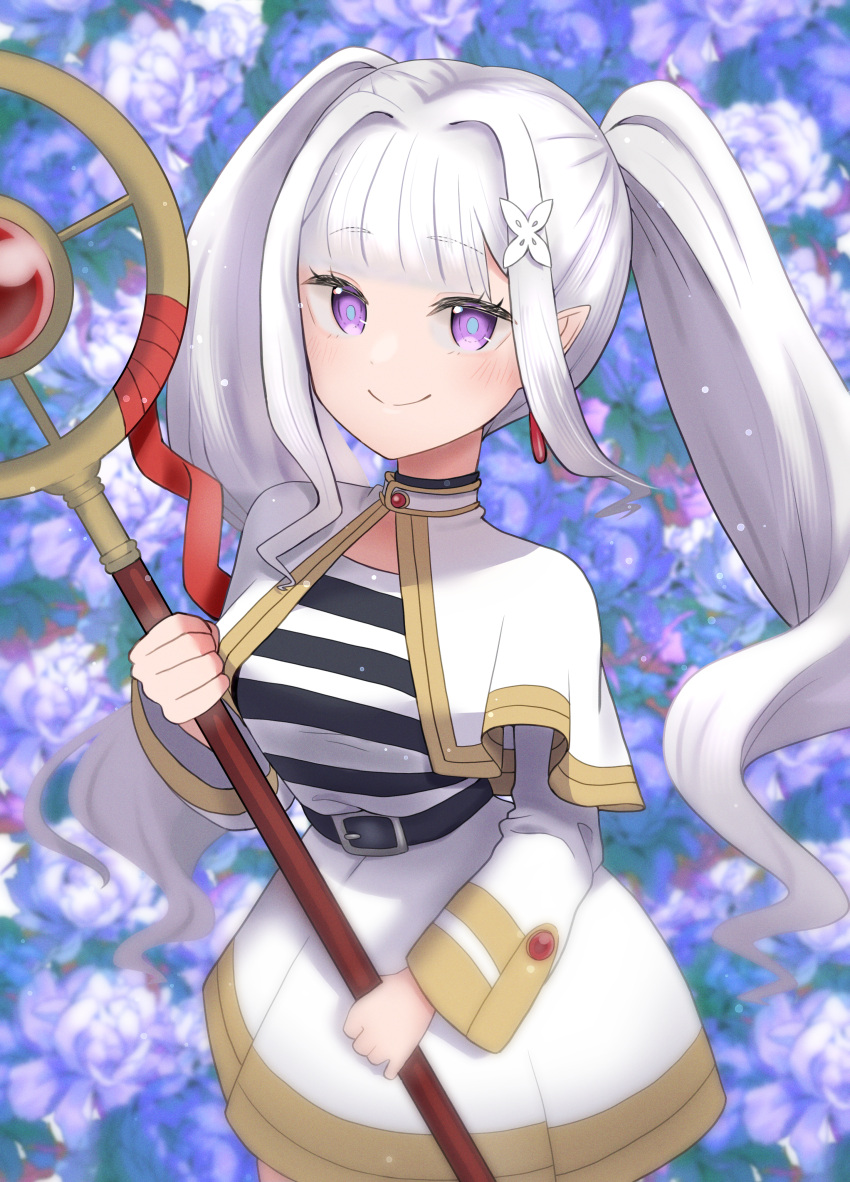 1girl 69_illust absurdres blurry blurry_background blush capelet closed_mouth commentary_request cosplay dangle_earrings depth_of_field drop_earrings earrings elf emilia_(re:zero) flower frieren hair_ornament highres holding holding_staff jewelry long_hair long_sleeves looking_at_viewer mage_staff nemophila_(flower) pointy_ears re:zero_kara_hajimeru_isekai_seikatsu shirt sidelocks smile solo sousou_no_frieren staff striped_clothes striped_shirt twintails violet_eyes white_capelet white_hair x_hair_ornament