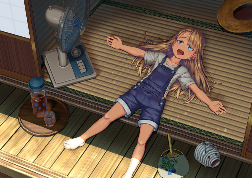 1girl barefoot blonde_hair blue_eyes blue_overalls bottle child collarbone commentary cup electric_fan grey_shirt hand_fan hat hot long_hair lying on_floor open_mouth original outstretched_arms overall_shorts overalls porcelain rural shigatsu_itsuka shirt short_sleeves shouji sliding_doors solo straw_hat summer sweat swept_bangs tatami tongue tongue_out tray unworn_hat unworn_headwear veranda wooden_floor