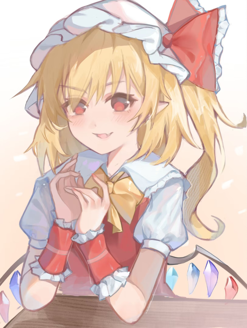 1girl ascot blonde_hair crystal_wings fang flandre_scarlet hat hat_ribbon highres medium_hair mob_cap open_mouth pointy_ears puffy_short_sleeves puffy_sleeves red_eyes red_ribbon ribbon short_sleeves side_ponytail skin_fang smile table touhou upper_body user_ptvs3537 wrist_cuffs