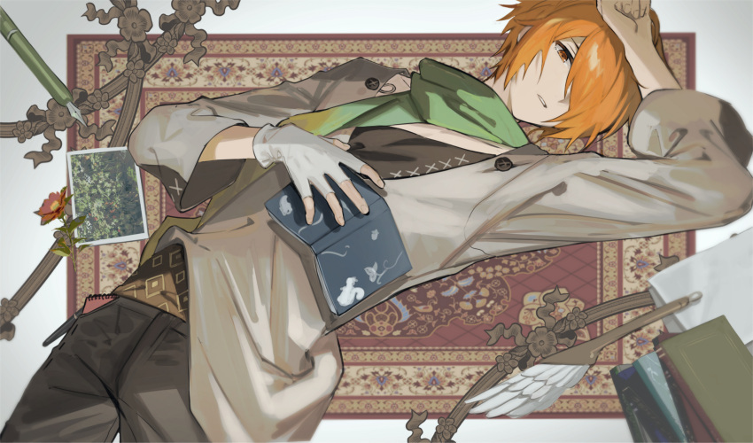 1boy arm_up black_pants black_shirt book brown_jacket commentary_request green_scarf hair_over_one_eye hayama_eishi highres holding holding_book idolmaster idolmaster_side-m jacket long_sleeves looking_at_viewer lying male_focus on_back orange_eyes orange_hair pants parted_lips photo_(object) quill scarf shirt simple_background solo tsukumo_kazuki white_background