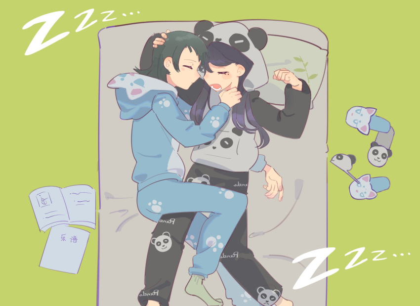 2girls animal_hood animal_print bang_dream! bang_dream!_it's_mygo!!!!! bear_print black_hair blue_hoodie blue_pants book closed_eyes closed_mouth commentary cuddling from_above green_background green_socks hand_on_another's_chest hand_on_another's_head highres hood hoodie long_hair lying mole mole_under_eye multiple_girls on_back on_bed on_side open_mouth panda_hood panda_print pants shiina_taki simple_background sleeping slippers socks takechi63 violet_eyes yahata_umiri yuri zzz