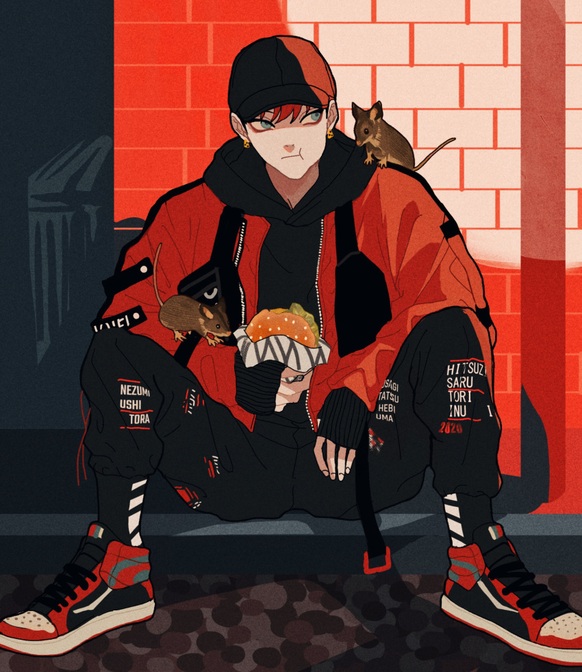 1boy alley animal baseball_cap black_hoodie blue_eyes burger closed_mouth clothes_writing eating expressionless food full_body hat highres hood hoodie jacket long_sleeves looking_to_the_side male_focus morio_(m_machi) mouse original pants puffy_cheeks red_footwear red_jacket redhead road shoes short_hair sitting sneakers solo street sweatpants