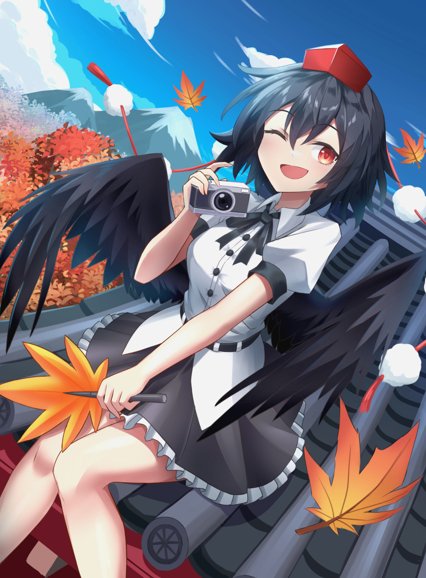 1girl 74239600 ;d absurdres autumn_leaves belt bird_wings black_belt black_ribbon black_skirt black_wings blue_sky breasts camera clouds cloudy_sky collared_shirt day falling_leaves feathered_wings frilled_skirt frills hand_fan happy hat hauchiwa highres holding holding_camera holding_fan leaf medium_breasts miniskirt mountainous_horizon neck_ribbon on_roof one_eye_closed open_mouth pom_pom_(clothes) puffy_short_sleeves puffy_sleeves red_eyes red_hat ribbon shameimaru_aya shirt short_hair short_sleeves sitting skirt sky smile solo tokin_hat touhou tree white_shirt wings