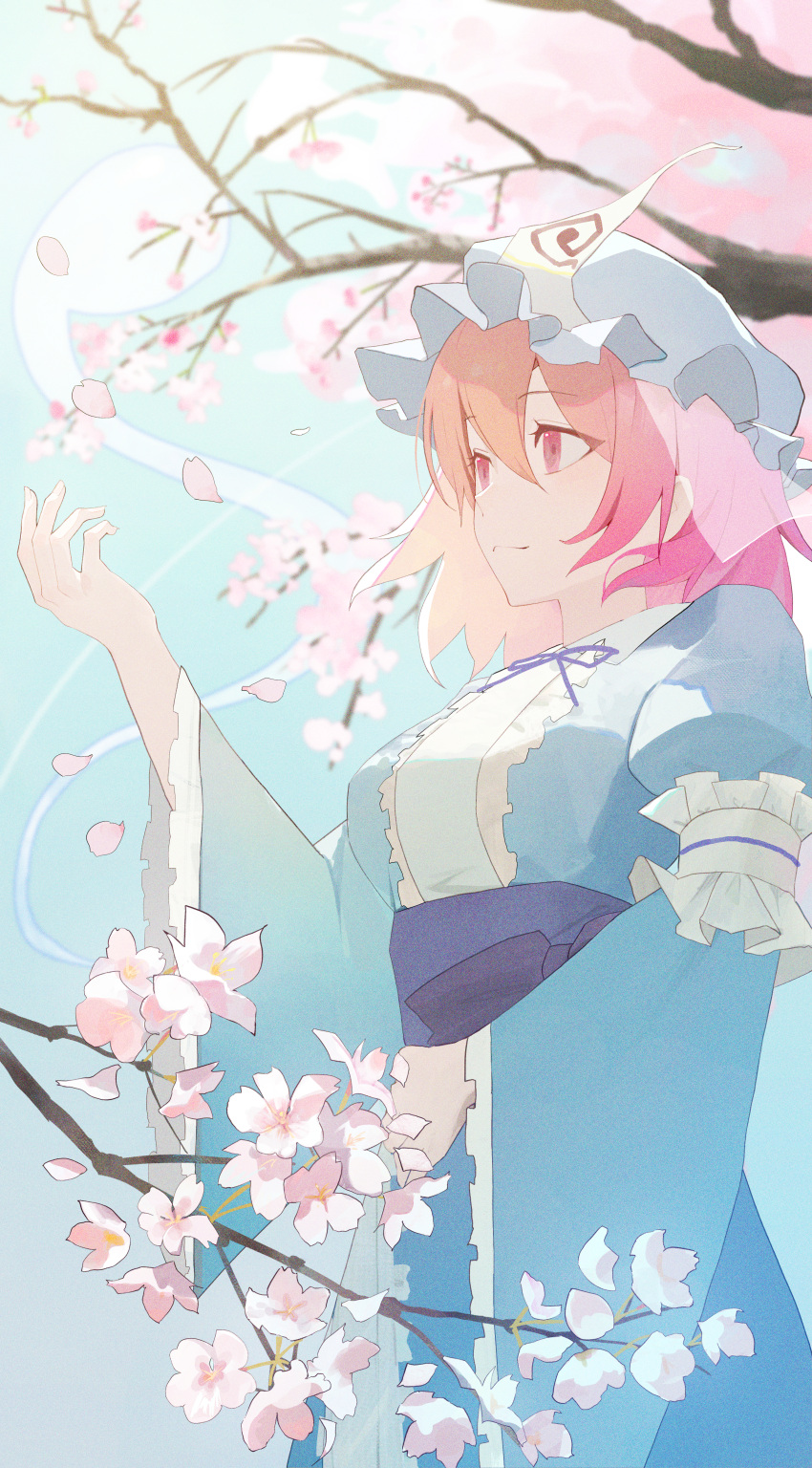 1girl absurdres blue_kimono branch cherry_blossoms closed_mouth commentary falling_petals flower frilled_kimono frills hat highres japanese_clothes kimono long_sleeves mob_cap obi palulap petals pink_eyes pink_flower pink_hair pink_petals saigyouji_yuyuko sash short_hair sleeve_garter smile solo touhou tree triangular_headpiece wide_sleeves
