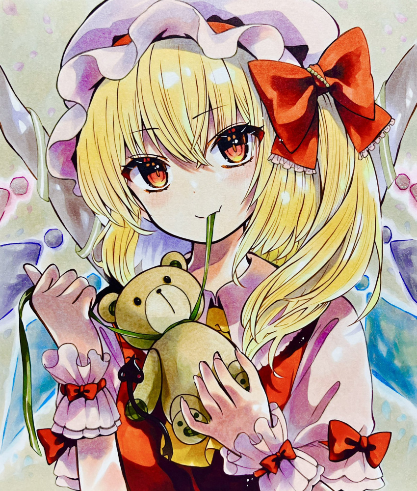 1girl ascot blonde_hair blush bow crystal flandre_scarlet green_ribbon hat hat_bow highres long_hair looking_at_viewer mob_cap mouth_hold multicolored_wings one_side_up red_bow red_eyes red_vest ribbon ribbon_in_mouth side_ponytail solo stuffed_animal stuffed_toy teddy_bear touhou vest wings wrist_cuffs yellow_ascot yuzugoori