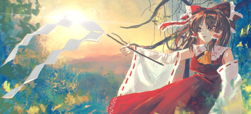 1girl ascot bow brown_hair detached_sleeves frilled_bow frilled_hair_tubes frills gohei hair_bow hair_tubes hakurei_reimu hat highres long_hair nature oiceringi red_bow red_skirt ribbon-trimmed_sleeves ribbon_trim skirt skirt_set sun touhou upper_body witch_hat yellow_ascot