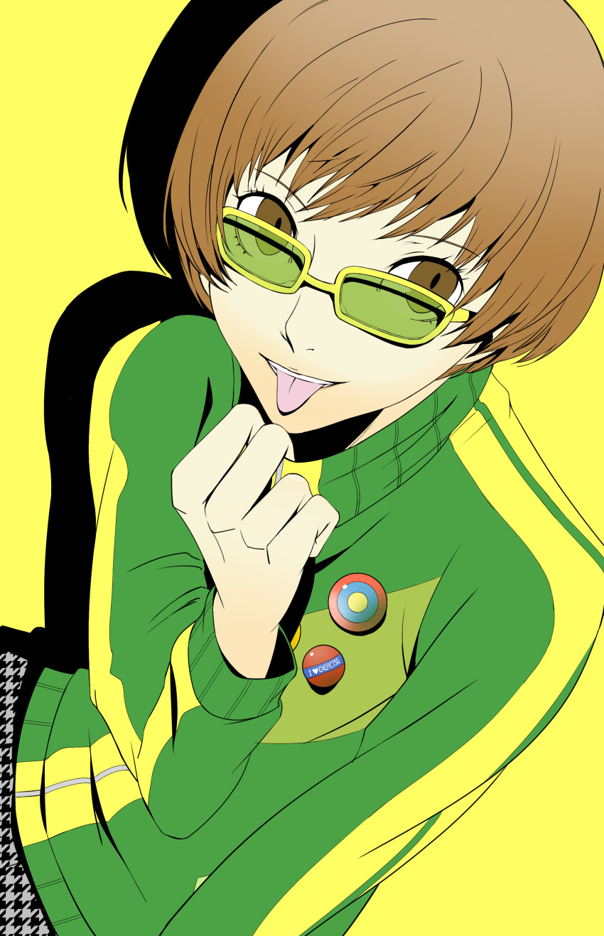 1girl absurdres badge brown_eyes brown_hair button_badge green_jacket hareruya_(smomo2227) highres houndstooth jacket juvenile light_brown_hair persona persona_4 reverse_trap satonaka_chie short_hair simple_background solo teenage tomboy tongue tongue_out track_jacket yellow-framed_eyewear yellow_background young
