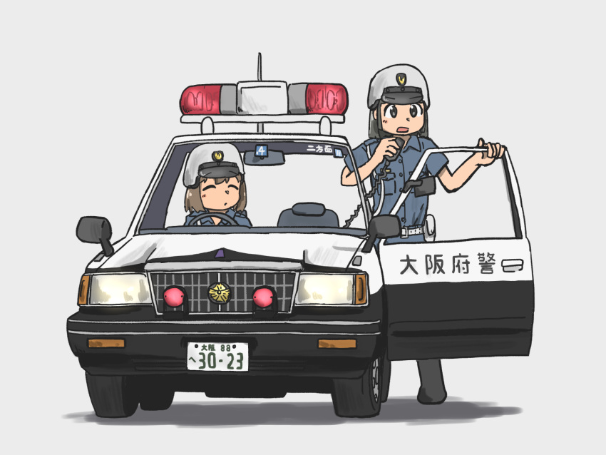 2girls blue_shirt car grey_background grey_hair helmet highres holding holding_microphone looking_to_the_side medium_hair microphone motor_vehicle multiple_girls ni_tsuma nissan nissan_cedric open_door open_mouth original police police_car shirt simple_background standing steering_wheel wire