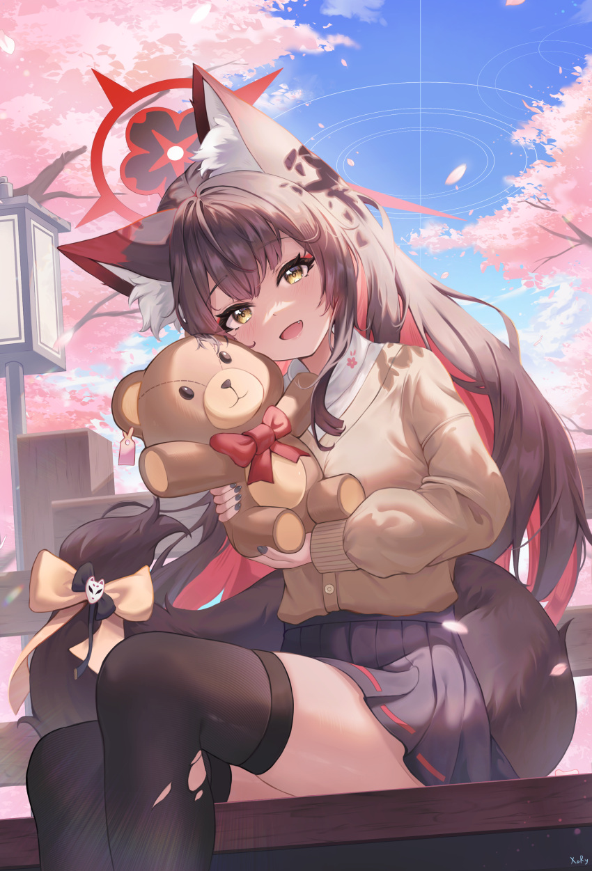 1girl :d absurdres alternate_costume animal_ear_fluff animal_ears bench black_hair black_skirt black_thighhighs blue_archive blunt_bangs blurry brown_cardigan cardigan casual cherry_blossoms colored_inner_hair commentary_request depth_of_field eyeshadow falling_petals fox_ears fox_girl fox_tail hair_between_eyes halo head_tilt highres hugging_doll hugging_object lamppost long_hair long_sleeves looking_at_viewer makeup multicolored_hair on_bench outdoors park_bench petals pleated_skirt red_eyeshadow sidelocks sitting skirt smile solo stuffed_animal stuffed_toy tail teddy_bear thigh-highs torn_clothes torn_thighhighs two-tone_hair wakamo_(blue_archive) xary yellow_eyes zettai_ryouiki