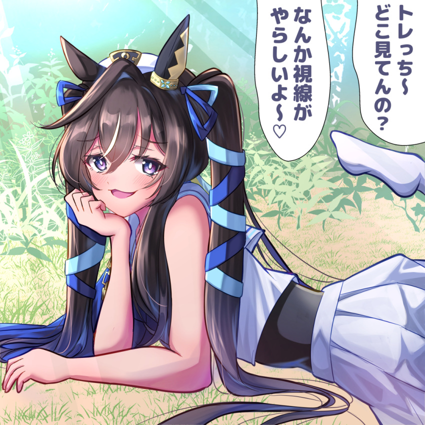 1girl animal_ears beret black_hair blurry blurry_background commentary_request earrings grass hair_between_eyes hair_ornament hat horse_ears horse_girl jewelry lens_flare looking_at_viewer lying on_stomach open_mouth remao single_earring solo twintails umamusume violet_eyes vivlos_(umamusume)