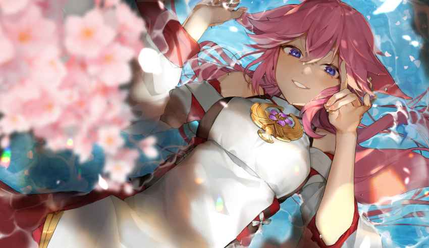 1girl absurdres afloat animal_ears bare_shoulders blurry cherry_blossoms crossed_bangs depth_of_field detached_sleeves dot_nose earrings falling_petals floppy_ears foreshortening fox_ears fox_shadow_puppet genshin_impact gold_necklace gold_trim hair_between_eyes hakama hakama_skirt hand_up highres japanese_clothes jewelry lens_flare light_blush long_hair looking_at_viewer lying_on_water necklace nontraditional_miko parted_lips petals pink_hair red_hakama refraction sake_kasu_big shadow shirt sidelocks single_earring single_hair_intake skirt sleeveless sleeveless_shirt smile sunlight teeth turtleneck violet_eyes white_shirt wide_sleeves yae_miko
