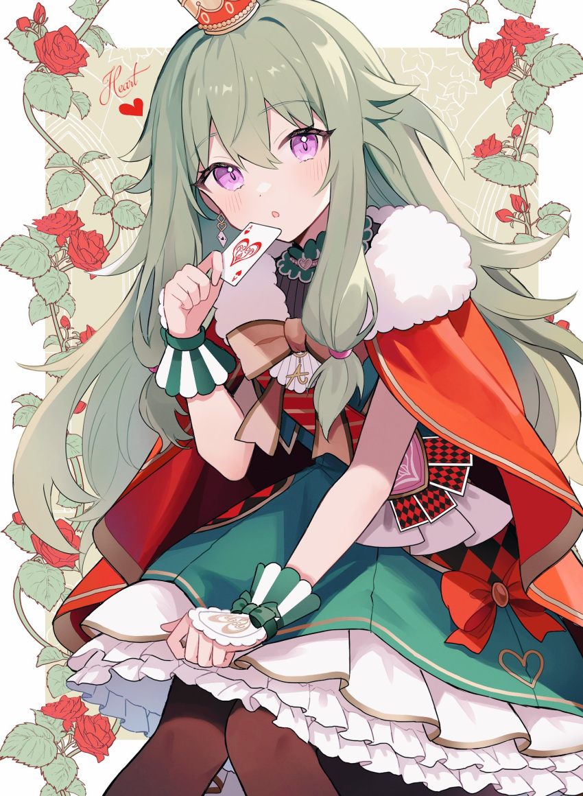 1girl :o ace_(playing_card) ace_of_hearts black_pantyhose blush border capelet card crown dot_nose fur-trimmed_capelet fur_trim green_hair green_skirt green_wrist_cuffs hair_between_eyes heart highres holding holding_card hrn_ohana knees_together_feet_apart kusanagi_nene layered_skirt leaning_forward looking_at_viewer mini_crown open_mouth outside_border pantyhose petticoat playing_card pleated_skirt project_sekai red_capelet signature sitting skirt solo violet_eyes white_border