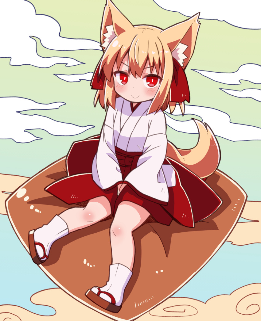 1girl animal_ears blonde_hair closed_mouth clouds commentary_request cushion fox_ears fox_girl fox_tail full_body geta hakama highres japanese_clothes kimono long_sleeves looking_at_viewer miko obi original red_eyes red_hakama red_sash sash short_hair sitting smile socks solo tabi tail white_kimono white_socks wide_sleeves yukinagi