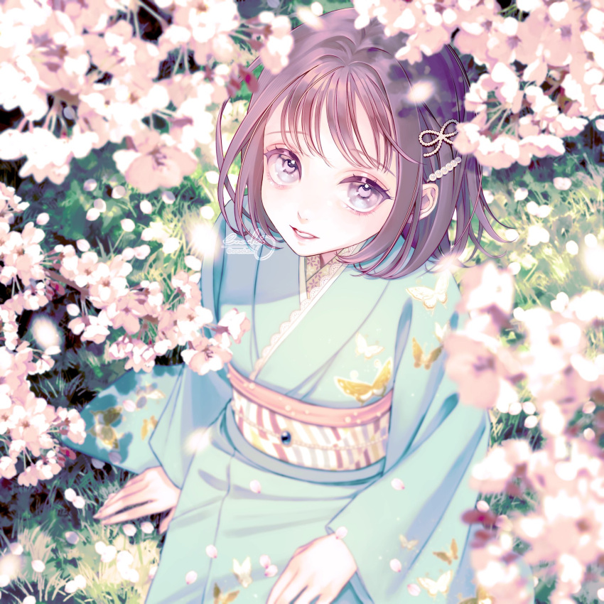 1girl black_hair blue_kimono cherry_blossoms commentary_request day enahamaru full_body grass grey_eyes hair_ornament highres japanese_clothes kimono looking_at_viewer obi original outdoors parted_lips sash short_hair sitting smile solo sunlight