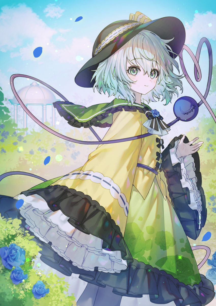 1girl absurdres ascot black_bow black_bowtie black_hat black_pantyhose blue_flower blue_rose blue_sky bow bowtie closed_mouth clouds commentary_request day falling_petals flower frilled_skirt frilled_sleeves frills gazebo green_eyes green_hair green_skirt hand_up hat heart heart_of_string here_(hr_rz_ggg) highres komeiji_koishi long_sleeves looking_at_viewer medium_hair outdoors pantyhose petals rose skirt sky sleeves_past_fingers sleeves_past_wrists smile solo third_eye touhou white_ascot wide_sleeves