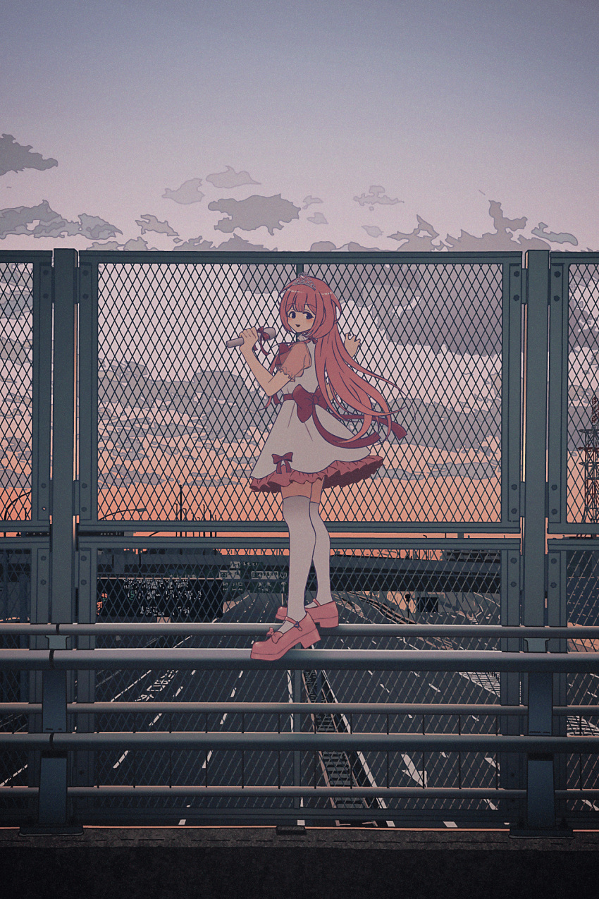 1girl :d black_eyes bridge chain-link_fence clouds cloudy_sky dress evening fence frilled_dress frills from_side hand_up highres highway holding holding_microphone long_hair looking_at_viewer microphone nijisanji nkymyura open_mouth outdoors pink_footwear pink_hair railing shoes short_dress short_sleeves sidelocks sky smile solo suo_sango thigh-highs tiara virtual_youtuber walking_on_railing white_dress white_thighhighs wide_shot zettai_ryouiki