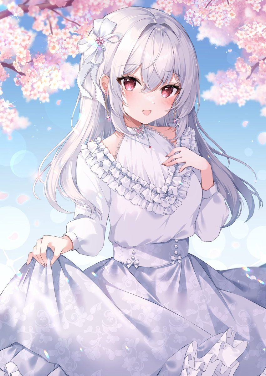 1girl :d blush cherry_blossoms clothes_lift commentary_request dress dress_lift frilled_dress frills hair_between_eyes hair_ribbon highres long_hair long_sleeves looking_at_viewer open_mouth original outdoors red_eyes ribbon sidelocks smile solo white_dress white_hair ymkrnchan