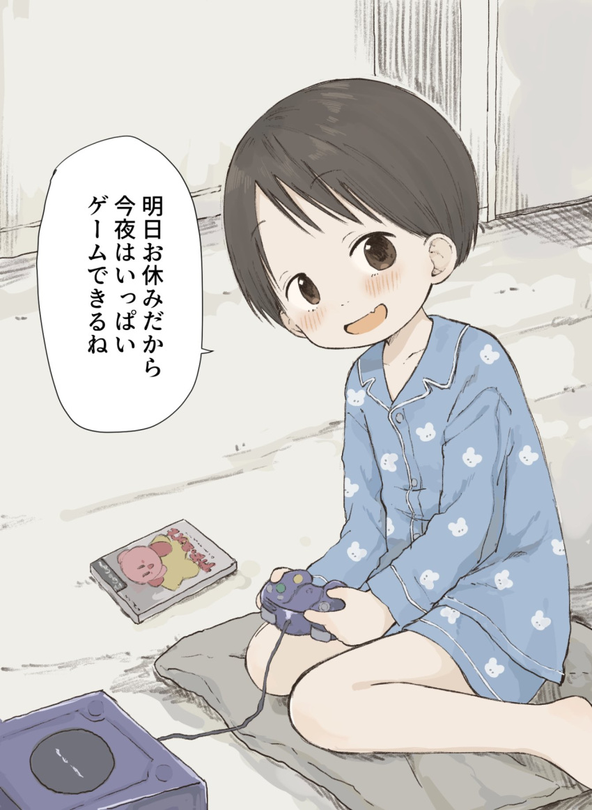 1girl :d bare_legs barefoot black_hair blue_pajamas blue_shirt blue_shorts blush brown_eyes buttons child collarbone collared_shirt commentary_request controller fang game_console game_controller gamecube gamecube_controller highres ichigo_mashimaro indoors itou_chika kirby_(series) long_sleeves looking_at_viewer nanoningen_(anapoko) on_pillow open_mouth pajamas pillow print_pajamas shirt short_hair short_shorts shorts sitting skin_fang smile solo translation_request wariza