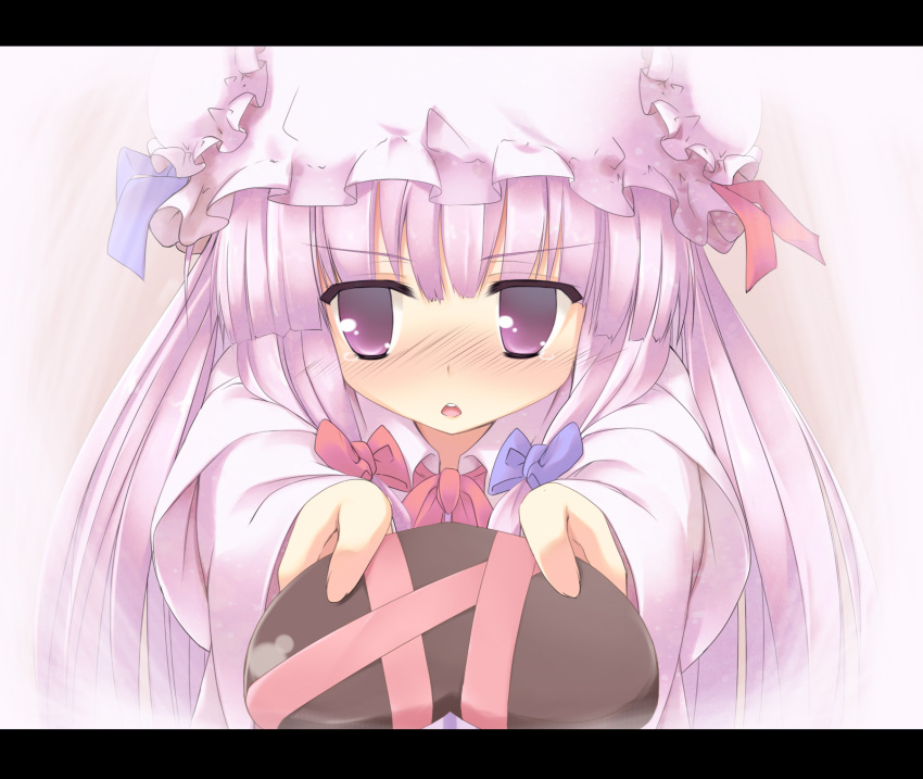 blush chocolate chocolate_heart hat heart highres holding holding_gift incoming_gift long_hair patchouli_knowledge pilky purple_eyes purple_hair ribbon solo touhou valentine violet_eyes