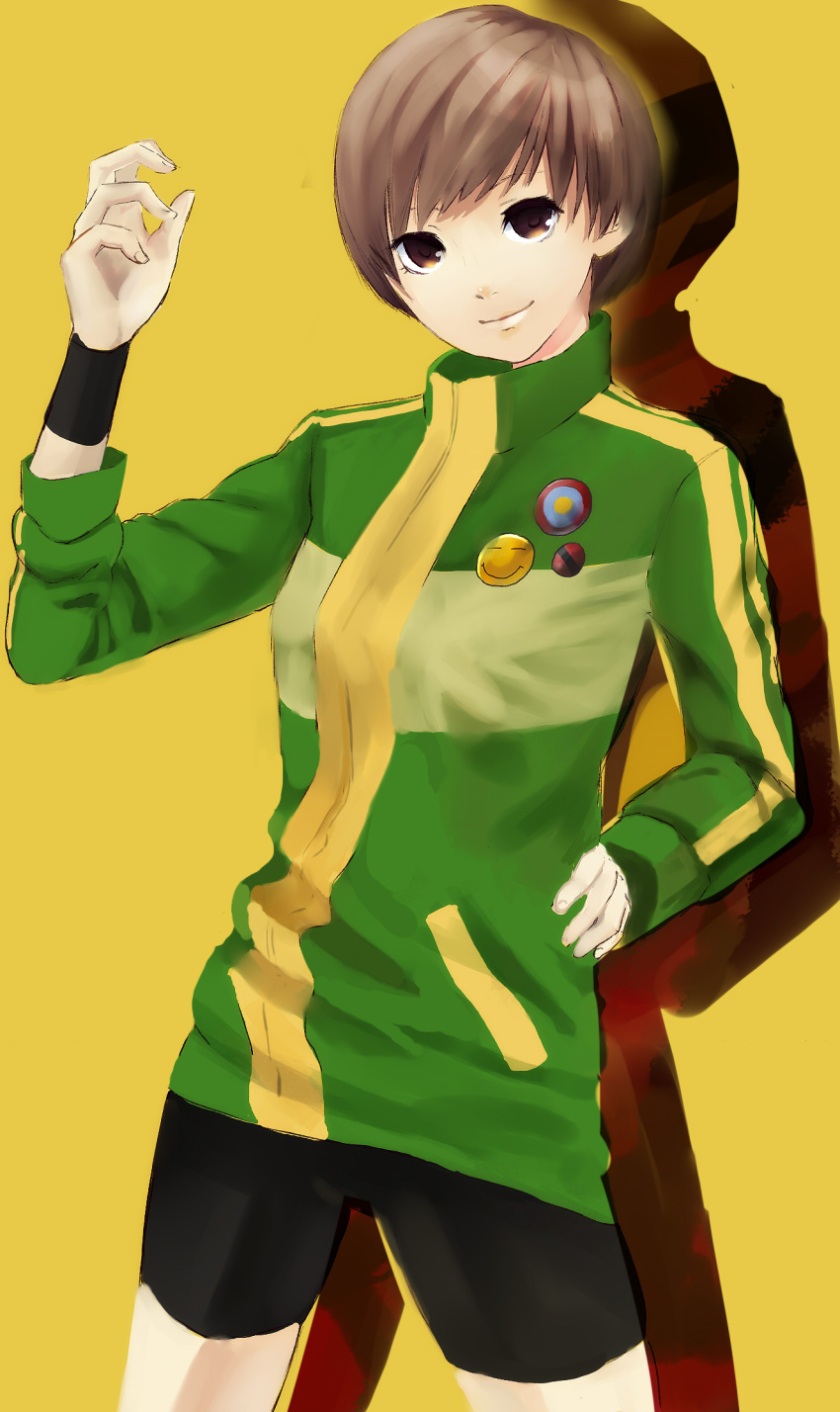 brown_eyes brown_hair highres persona persona_4 satonaka_chie short_hair sleeves_pushed_up smile smiley_face track_jacket wristband