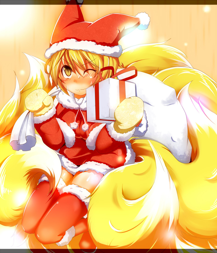 &gt;:3 :3 alternate_costume blonde_hair blush christmas fox_tail gift gloves hat highres holding holding_gift multiple_tails santa_costume santa_hat short_hair solo tail tamahana thigh-highs thighhighs touhou wink yakumo_ran zettai_ryouiki