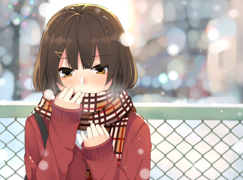 blush breath brown_eyes brown_hair bust cardigan chainlink_fence cold hair_ornament hairclip holding nuko_(mikupantu) original scarf sleeves_past_wrists snow snowing solo strap