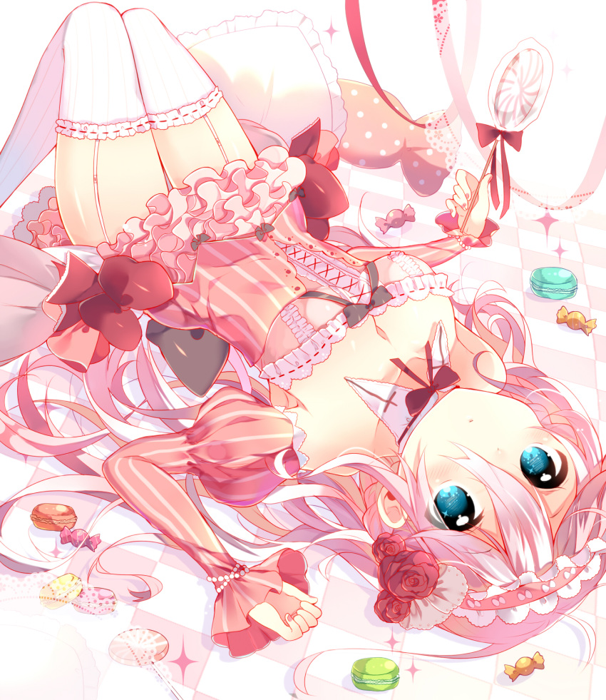 1girl blue_eyes breasts candy cleavage dress garter_straps highres ia_(vocaloid) ikari_(aor3507) lollipop long_hair lying macaron on_back pink_hair solo thigh-highs vocaloid wrapped_candy