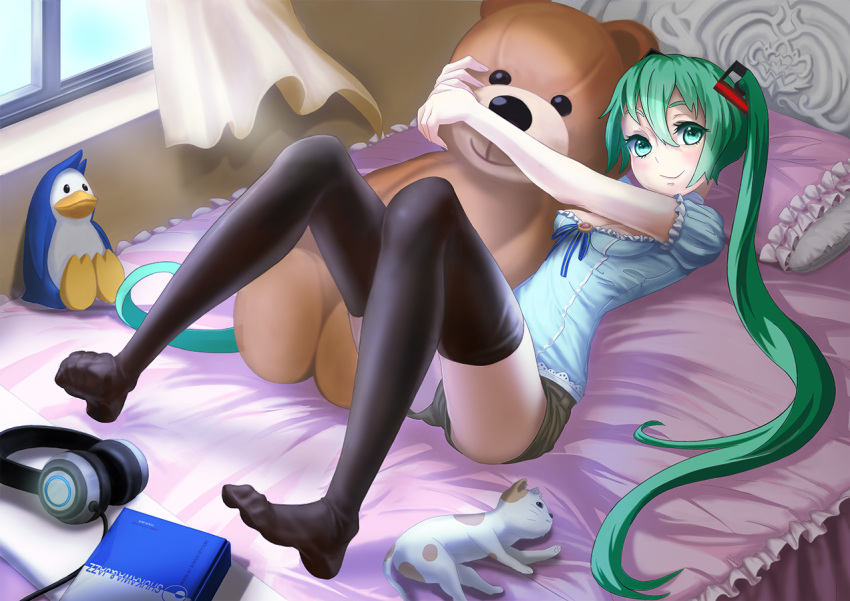 bed bird book cat curtains green_eyes green_hair hatsune_miku headphones long_hair looking_at_viewer on_back penguin pillow shorts smile solo stuffed_animal stuffed_toy teddy_bear thigh-highs thighhighs tiaworks twintails very_long_hair vocaloid window