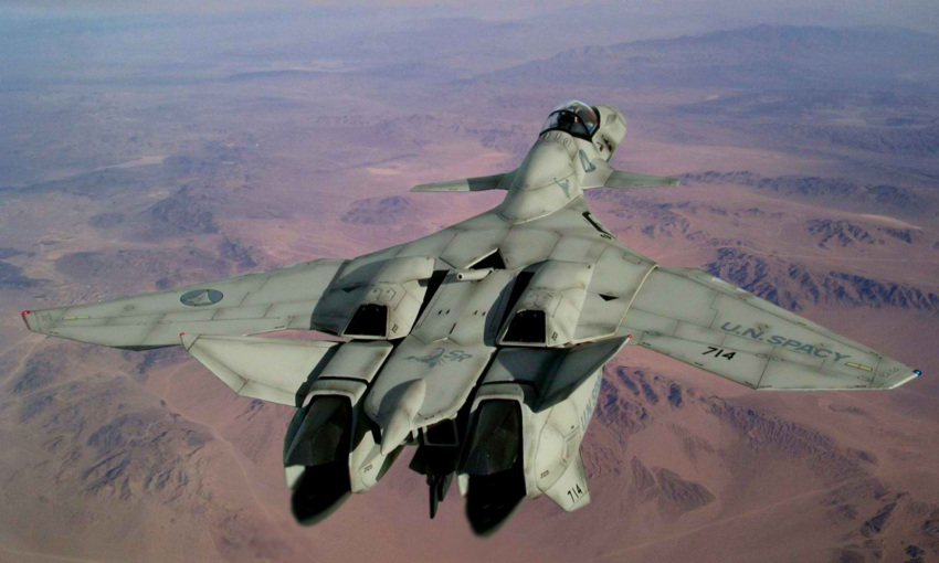 airplane canards desert flying highres jet logo macross macross_plus mecha mountain photorealistic science_fiction u.n._spacy vf-11