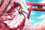  1girl ascot bai_kongque bird blue_sky bow brown_hair cherry_blossoms clouds detached_sleeves dove hair_bow hair_tubes hakurei_reimu long_hair looking_at_viewer ofuda outdoors ponytail red_eyes skirt skirt_hold skirt_set sky solo torii touhou tree very_long_hair 