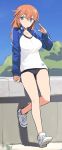  1girl bare_legs blue_eyes blush breasts buruma charlotte_e_yeager gym_uniform large_breasts long_hair looking_at_viewer lowres orange_hair shimada_fumikane shoes smile sneakers solo strike_witches 