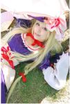  blonde_hair bow cosplay hat photo touhou yakumo_yukari yakumo_yukari_(cosplay) 